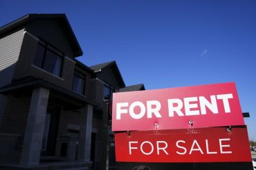A new report says the asking rent for a home in Canada in April was up 9.3 per cent compared with a year ago, while a slight month-over-month increase was also recorded for the first time since January. For rent and for sale signs are displayed on a house in a new housing development in Ottawa on Friday, Oct. 14, 2022. THE CANADIAN PRESS/Sean Kilpatrick April asking rent